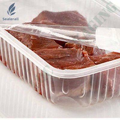 comprar Máquina de vedação automática de bandejas de carne de porco cozida online manufacture